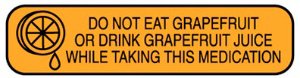 Picture of Pre-Printed Label Indeed Auxiliary Label Orange Paper Do Not Eat Grapefruit Or Drink Grapefruit Juice While Taking This Medication Black Safety and Instructional 3/8 X 1-5/8 Inch2959