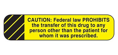 Picture of Pre-Printed Label Indeed Warning Label Yellow Paper Caution Federal Law Prohibits Black Caution 3/8 X 1-5/8 Inch2077