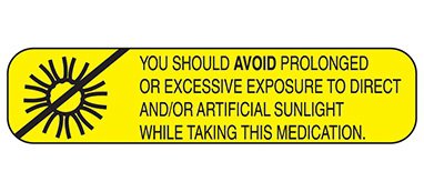 Picture of Pre-Printed Label Indeed Auxiliary Label Yellow Paper You Should Avoid Prolonged Or Excessive Exposure To Direct And/Or Artificial Sunlight While Taking This Medication Black Safety and Instructional 3/8 X 1-5/8 Inch2011