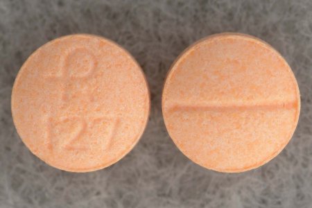 Picture of Clonidine HCl 0.1 mg Tablet Bottle 100 Tablets00228212710