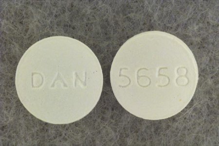 Picture of Cyclobenzaprine HCl 10 mg Tablet Bottle 100 Tablets00591565801