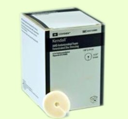 Picture of Antimicrobial Foam Dressing Kendall™ AMD 1/4 X 1 Inch Fenestrated Round Non-Adhesive without Border Sterile55512AMD