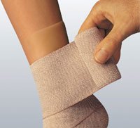 Picture of Compression Bandage Comprilan® 4 Inch X 11 Yard Standard Compression Clip Detached Closure Tan NonSterile77188