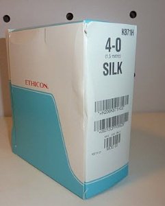 Picture of Suture with Needle Perma-Hand™ Nonabsorbable Coated Black Suture Braided Silk Size 4 - 0 30 Inch Suture 1-Needle 17 mm Length 1/2 Circle Taper Point NeedleK871H