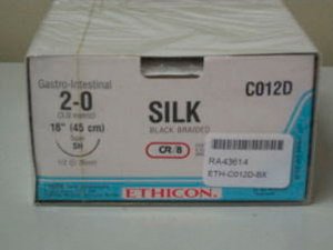 Picture of Suture with Needle Perma-Hand™ Nonabsorbable Coated Black Suture Braided Silk Size 2 - 0 18 Inch Suture 1-Needle 26 mm Length 1/2 Circle Taper Point NeedleC012D