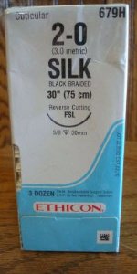 Picture of Suture with Needle Perma-Hand™ Nonabsorbable Coated Black Suture Braided Silk Size 2 - 0 30 Inch Suture 1-Needle 30 mm Length 3/8 Circle Reverse Cutting Needle679H