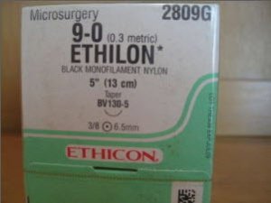 Picture of Suture with Needle Ethilon™ Nonabsorbable Uncoated Black Suture Monofilament Nylon Size 9 - 0 6 Inch Suture 1-Needle 6.5 mm Length 3/8 Circle Taper Point Needle2809G