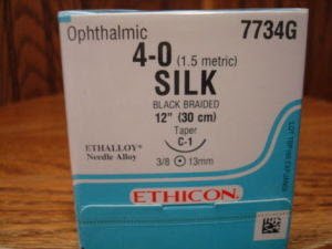 Picture of Suture with Needle Perma-Hand™ Nonabsorbable Coated Black Suture Braided Silk Size 4 - 0 12 Inch Suture 1-Needle 12 mm Length 3/8 Circle Taper Point Needle7734G