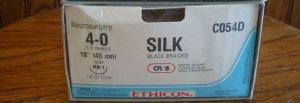 Picture of Suture with Needle Perma-Hand™ Nonabsorbable Coated Black Suture Braided Silk Size 4 - 0 18 Inch Suture 1-Needle 17 mm Length 1/2 Circle Taper Point NeedleC054D